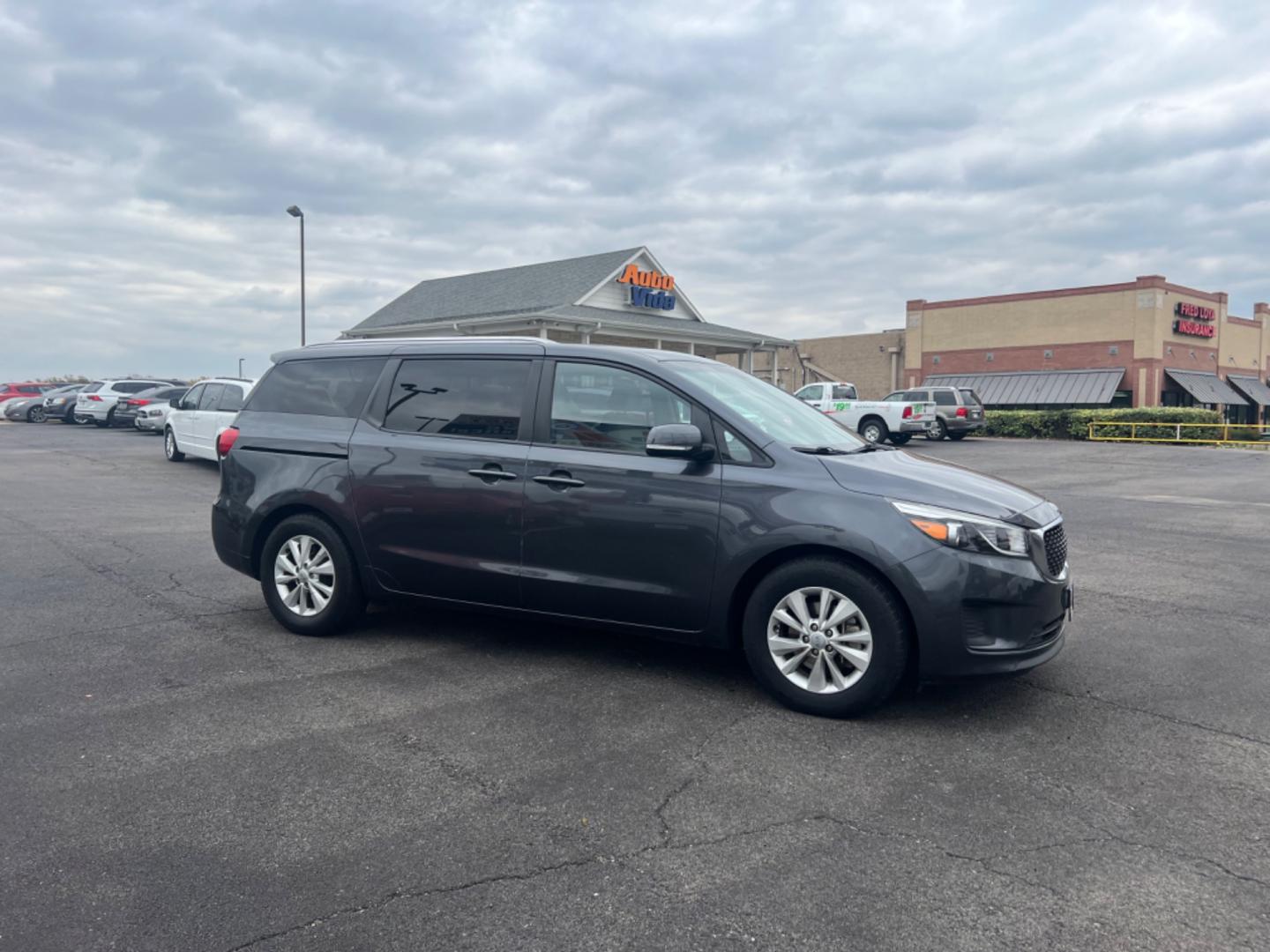 2016 GRAY Kia Sedona LX (KNDMB5C18G6) with an 3.3L V6 DOHC 24V engine, 6-Speed Automatic transmission, located at 420 I-35E, Lancaster, TX, 75146, (469) 297-4144, 32.593929, -96.823685 - Photo#6